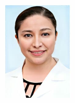 A female doctor in a white lab coat posing for a photo - Betzi N. Teran-Soto M.D.,FAAP A female doctor in a white lab coat posing for a photo - Betzi N. Teran-Soto M.D.,FAAP